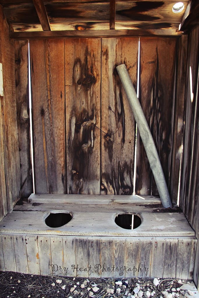 Outhouse at the abandoned Cedarvale School in Cedarvale, New Mexico.